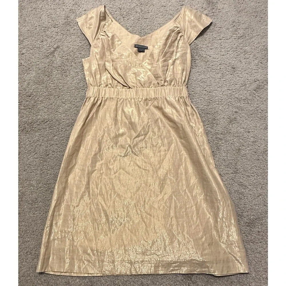 armani gold dress Winner and presenter Demi Moore wore a custom Giorgio Armani Priv strapless champagne silk gown accented with a curved geometric detail embellished with Swarovski crystals. Moore won Best Performance by a Female